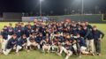 The 'Hoos hoists the championship belt, celebrating winning the Jax College Baseball Classic in right field following Sunday's late game. Photo courtesy of @jaxcbc via twitter.